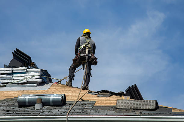 Professional Gutter Installation technician working in Bolinas, CA